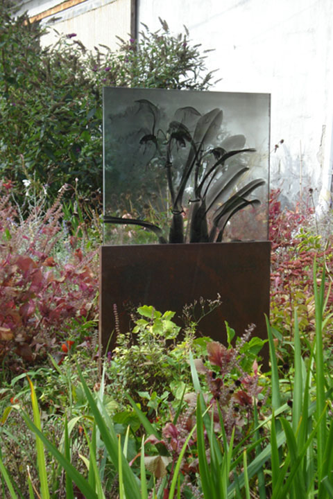 Glass, 2008, oxidized steel and jet spray on glass, 60 x 30 x 1 inches, installation at Steve Miller Garden